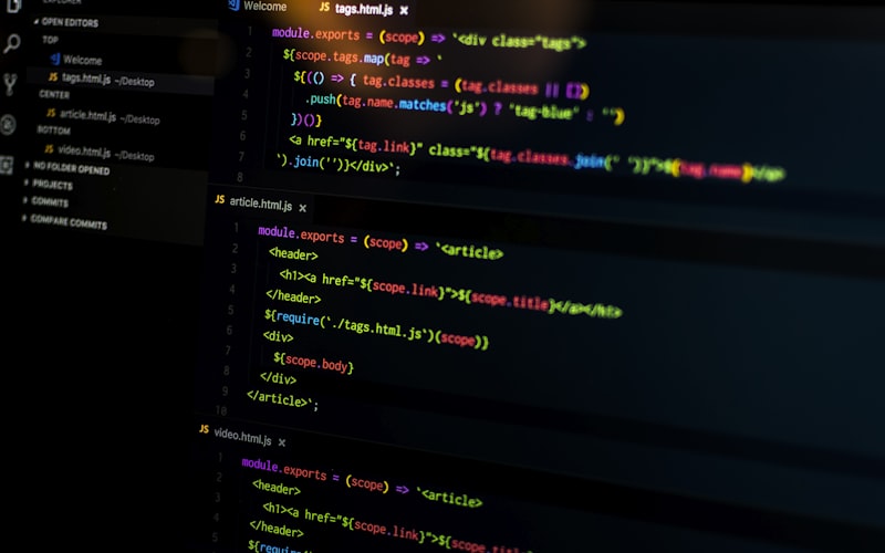 Developer reviewing code on a laptop